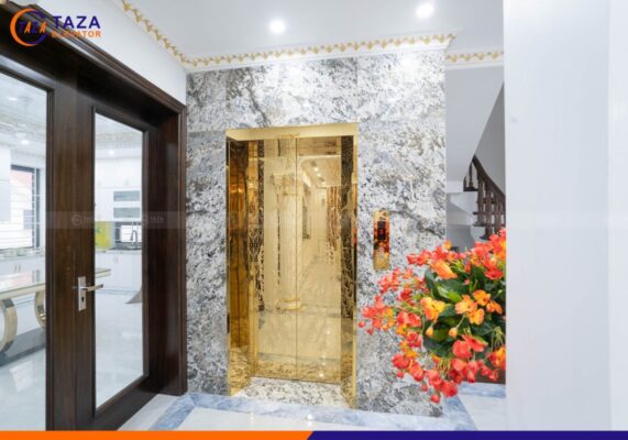 Thang máy gia đình inox gương vàng