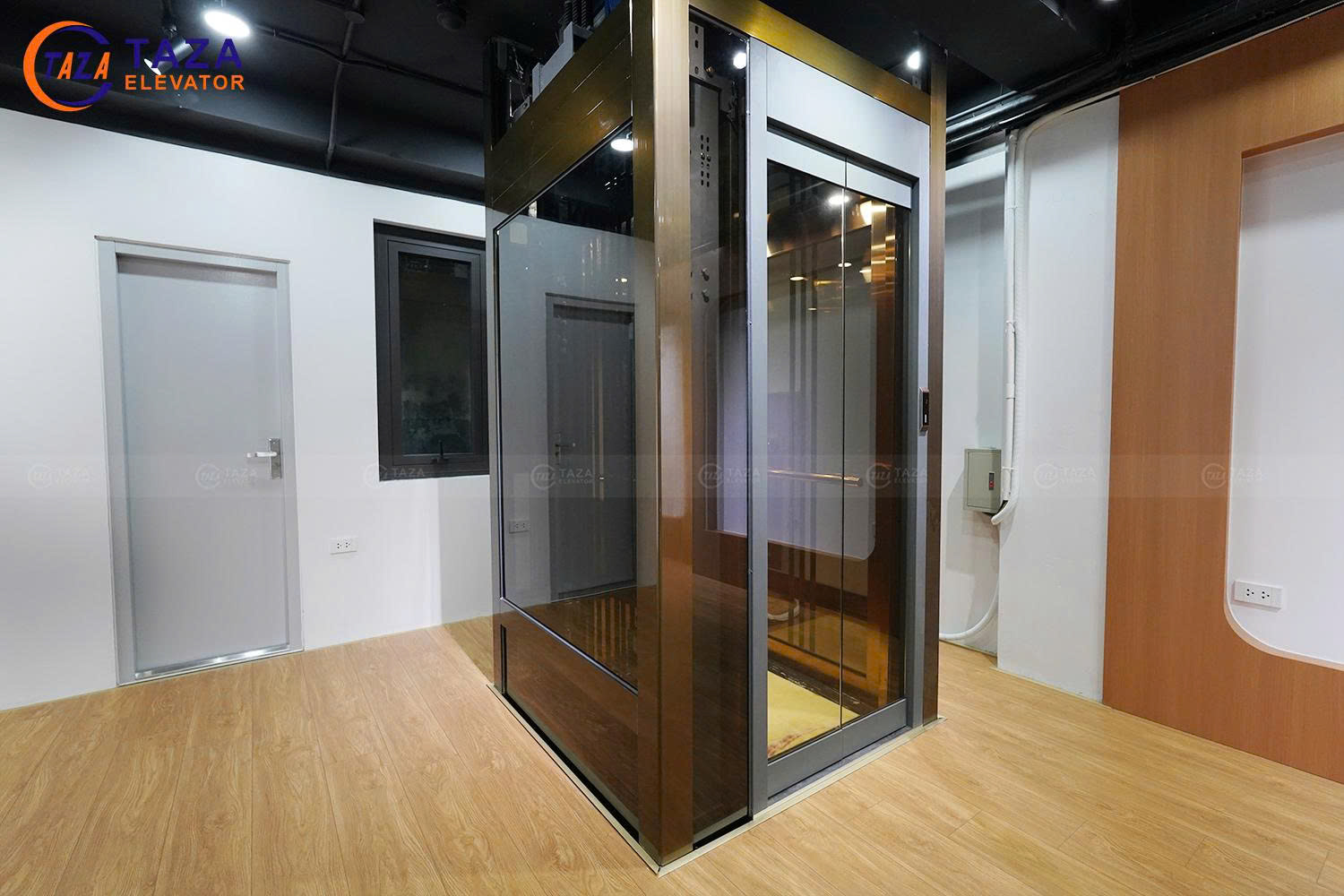 Thang máy kính Homelift cửa mở vuông góc