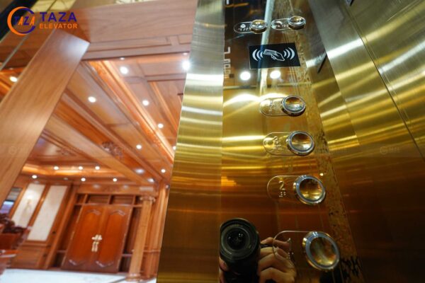 Thang máy inox gương vàng