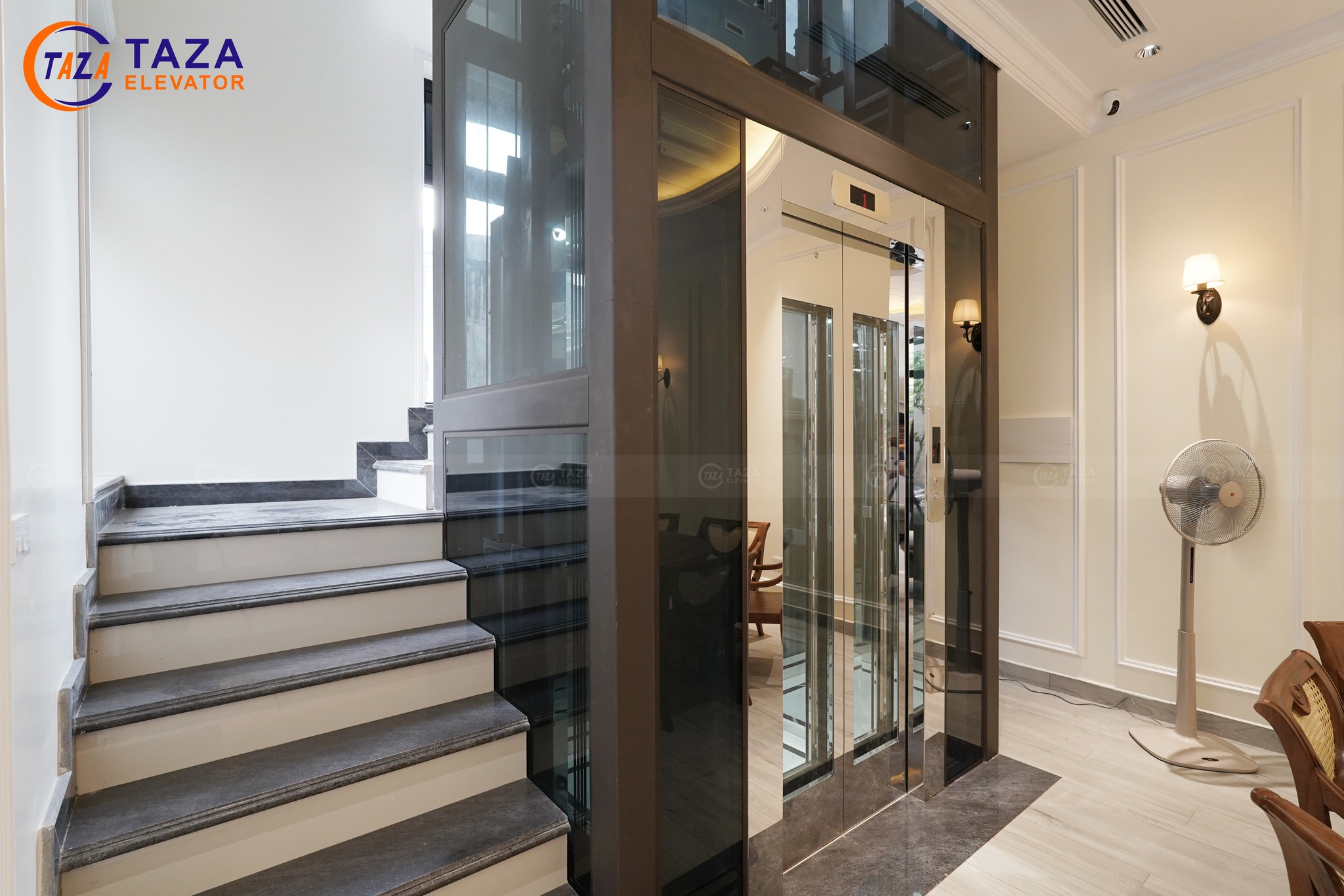 Thang máy kính và chính sách thanh toán tại Taza Elevator